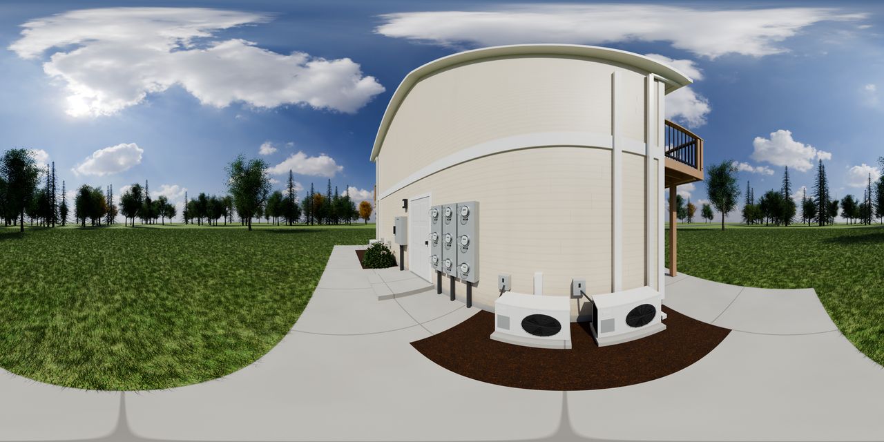 The end wall of the 8-plex with the owner door, electric meters and outdoor heating and cooling units.