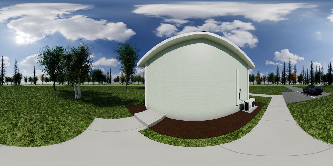 The end wall of the 2-plex with the owner door to the hall, its step and outdoor light, the outdoor unit of a studio’s heat pump, and a parking pad beyond.